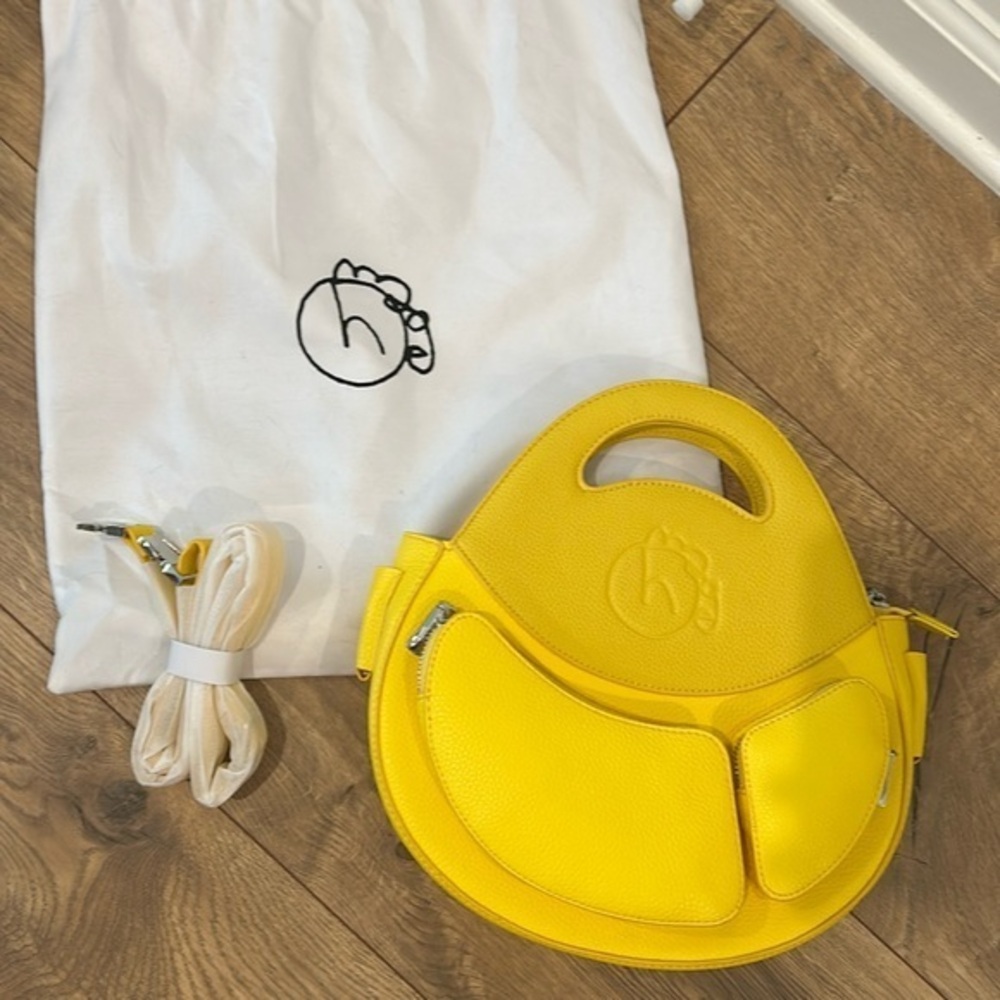 HOMAGE Yellow Circular Leather Handbag with Pockets